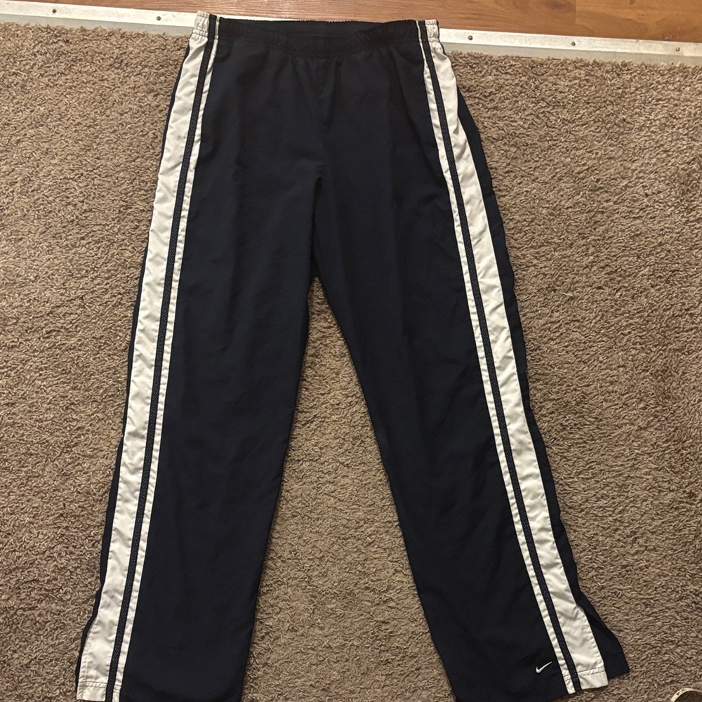Nike Woman’s Md Navy Pants White Stripes Down Sides Nike Swoosh Logo Bottom Leg